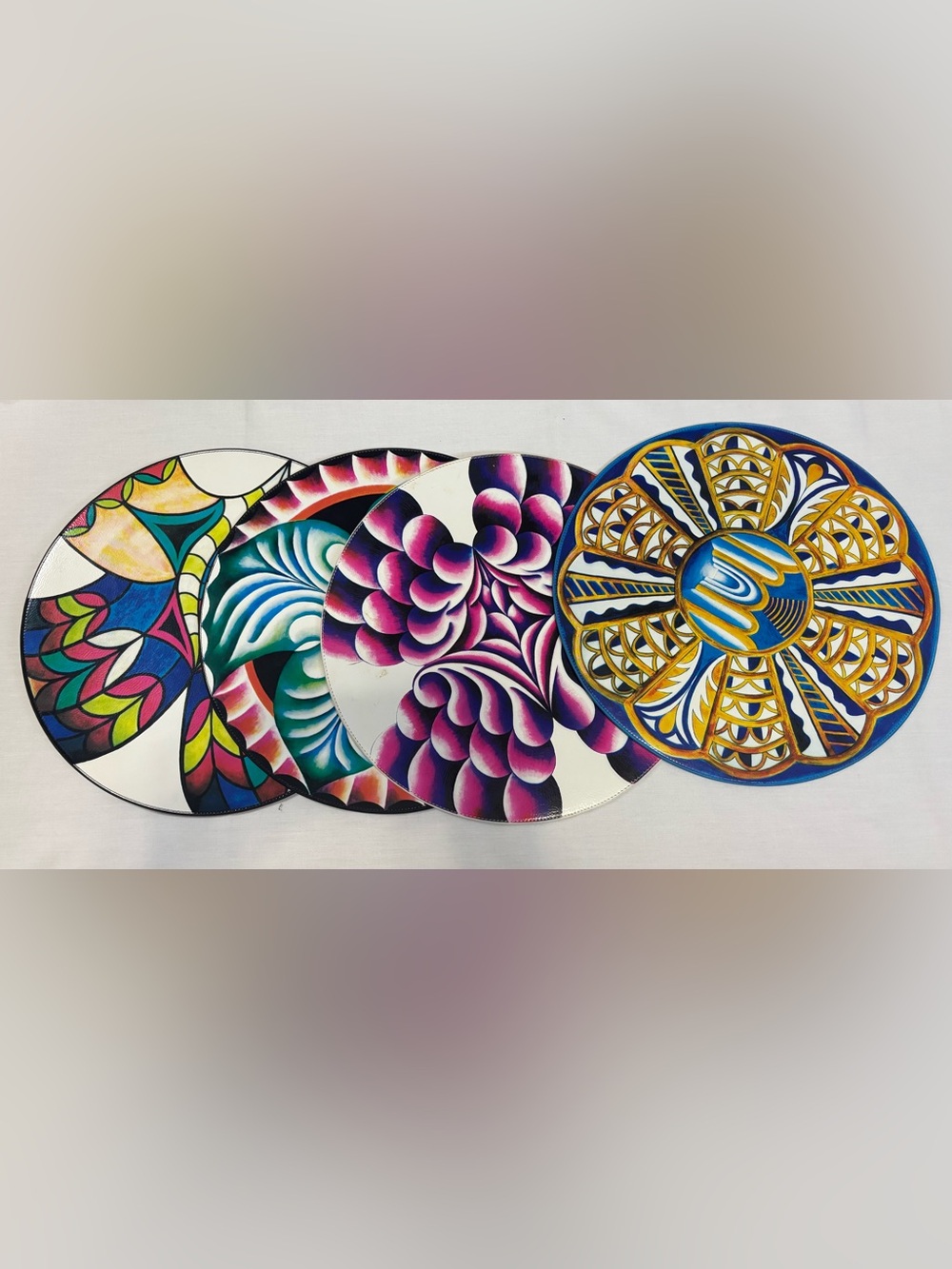 Rare and collectible Judy and Chicago The Dinner Party decorative plate set 4